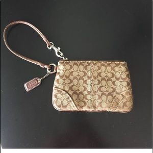 Small Coach signatute wristlet clutch bag